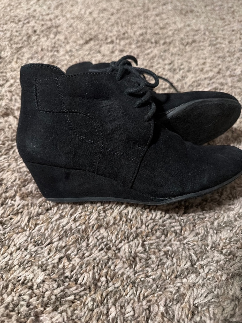 black BareTraps lace-up style in size 5.5